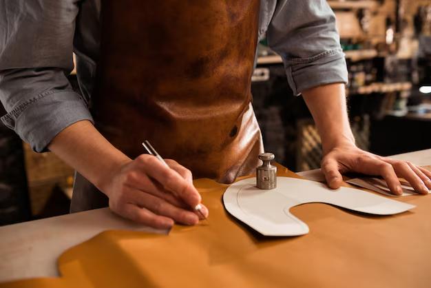 close up male shoemaker cutting leather textile 171337 12260 - Scorso Sports